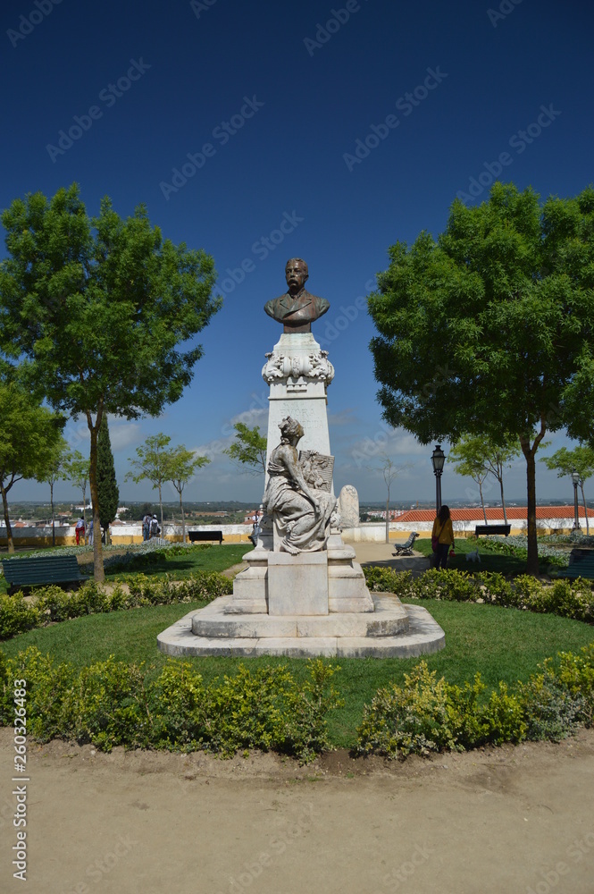 Obraz premium Sculpture Of Doctor Barahona In The Garden Of Diana In The City In Evora. Nature, Architecture, History, Street Photography. April 11, 2014. Evora, Portugal.