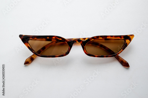 Fashionable sunglasses on a white background trend