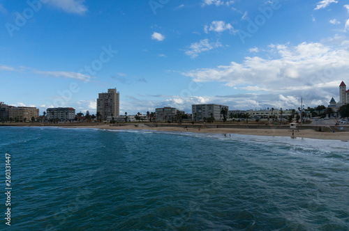 Unrecognizable people relaxing on the beach at Port Elizabeth, South Africa