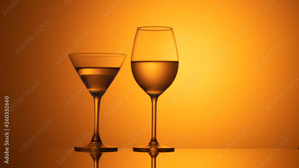 wine glasses dishes on a colored background wine glasses dishes on a colored background