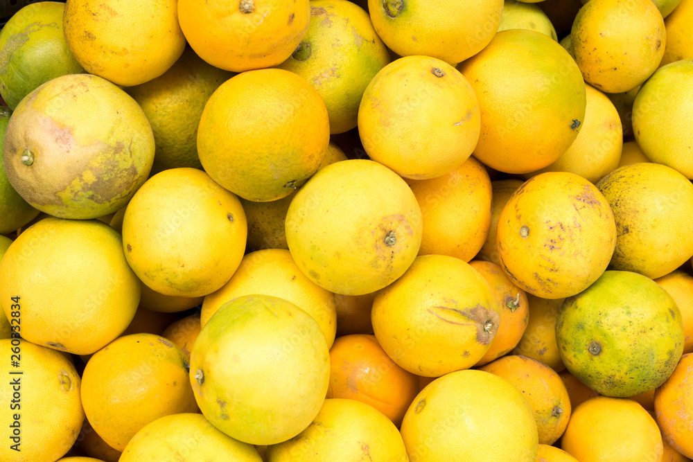 Full frame juicy natural looking Canarian oranges on a farmer market.