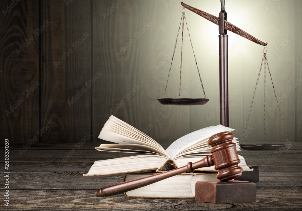 Justice Scales and books and wooden gavel on table. Justice concept Justice Scales and books and wooden gavel on table. Justice concept