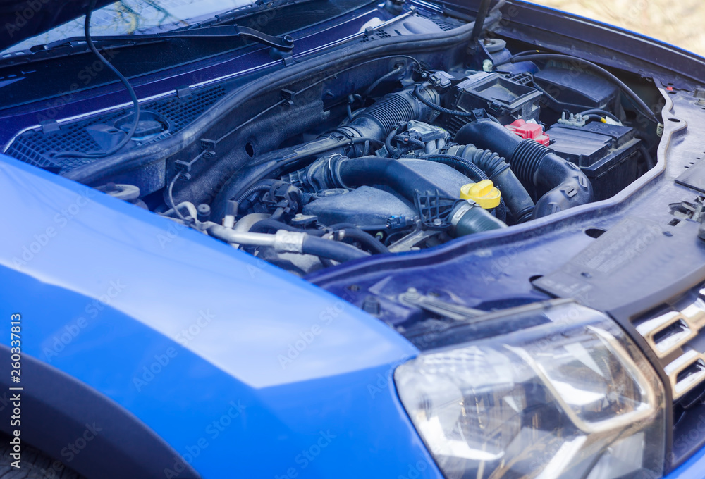 Fototapeta premium SUV car engine with hood open