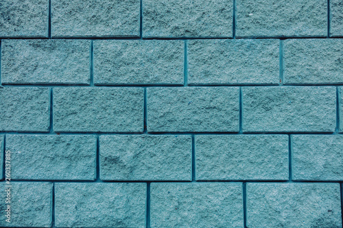 Blue brick wall background texture close up