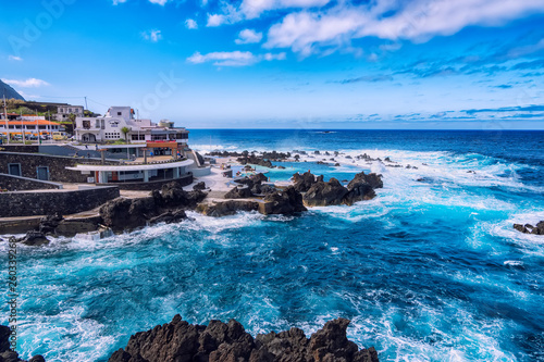 Rocky shore and natural pool. Porto Moniz, Madeira island, Portuga