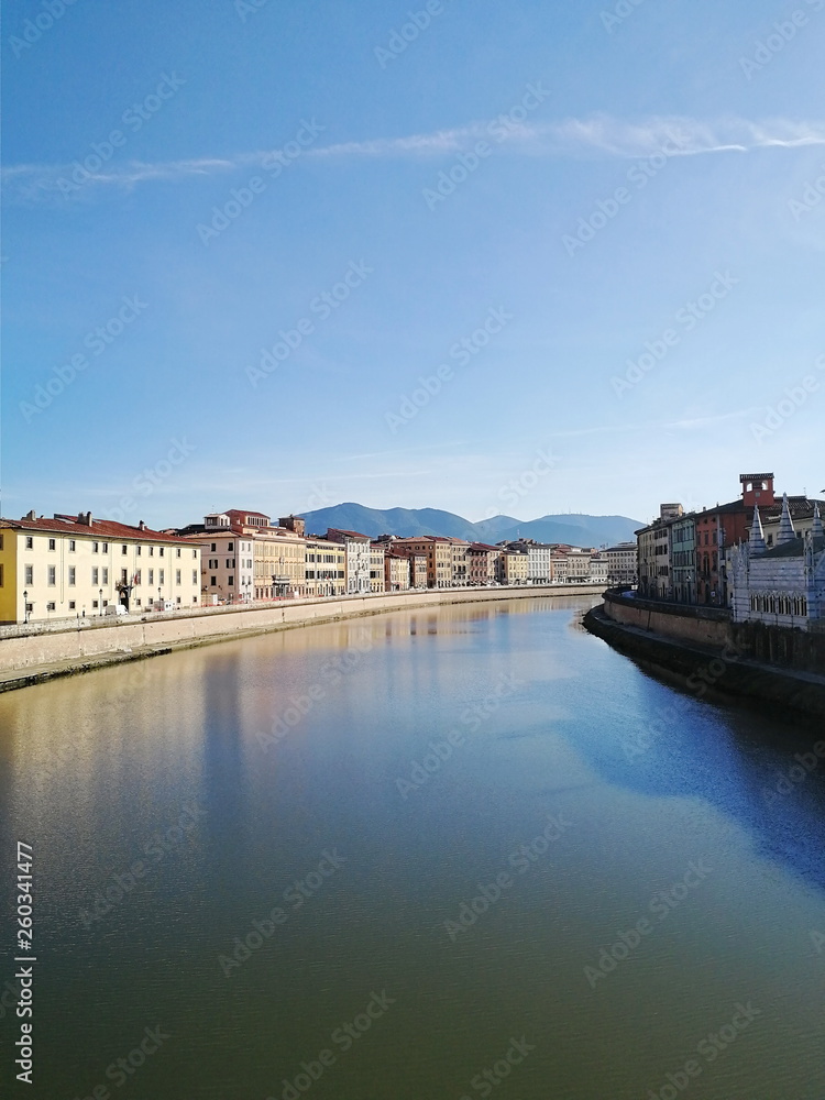 Pisa, Italy. View on the rive, quay, buildings. Arno Rive