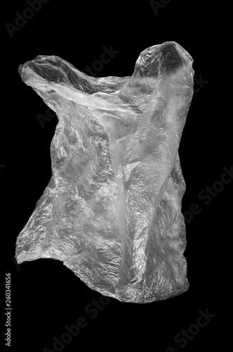 Crumpled plastic bag on a black background.
