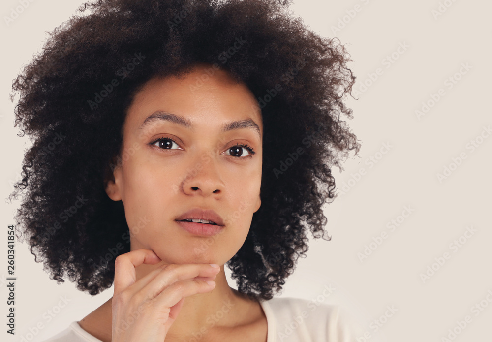 Young African American Woman Portrait. Naturally Beautiful Skin. Copy space Young African American Woman Portrait. Naturally Beautiful Skin. Copy space