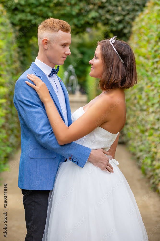Charming newlywed couple in Wallenstein garden in Prague, Czech Republic