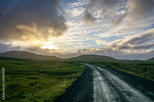 A Long Lonely Icelandic Road into the Sunset