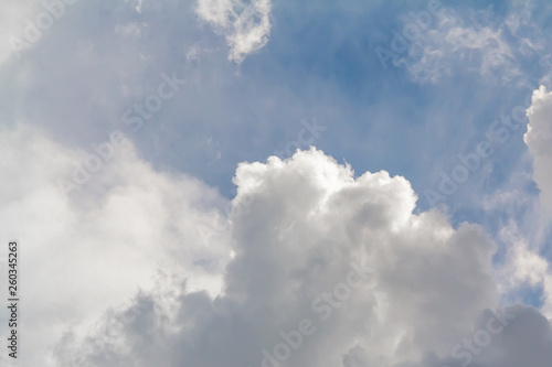 Beautiful white clouds in the blue sky, background