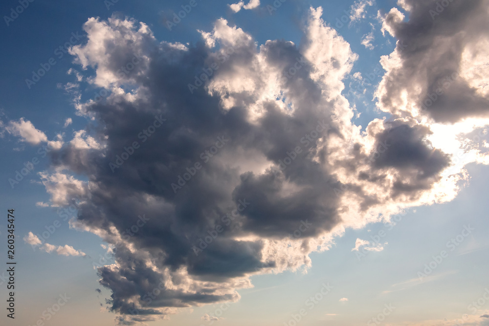 Streaks of cumulus clouds in the blue sky Streaks of cumulus clouds in the blue sky
