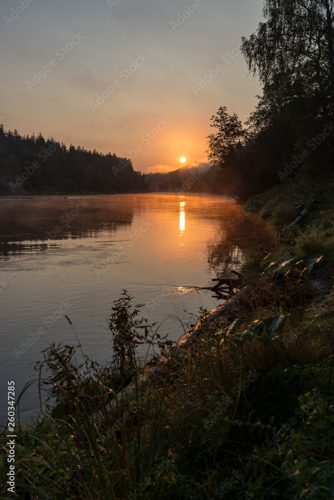Fototapeta premium colorful sunset on the river
