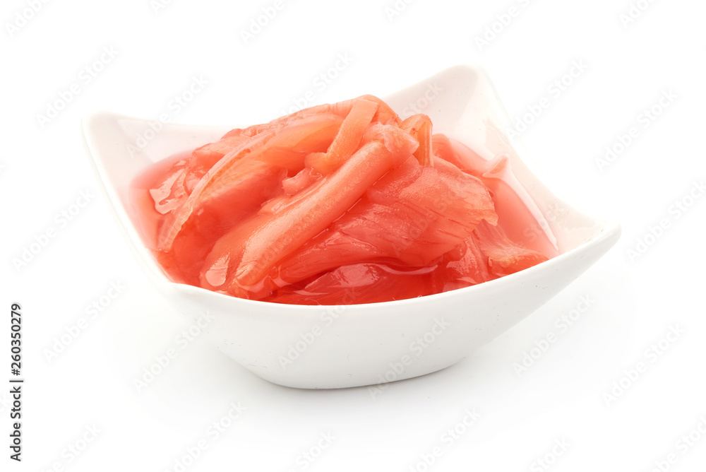 Marinated ginger slices in bowl, close-up, isolated on white background Marinated ginger slices in bowl, close-up, isolated on white background