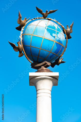 A Statue Of A Blue Terrestrial Globe With Doves Of Peace Around It In Kiev, Independence Square, Kiev, Ukraine photo