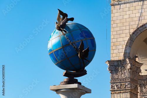 A Statue Of A Blue Terrestrial Globe With Doves Of Peace Around It In Kiev, Independence Square, Kiev, Ukraine photo