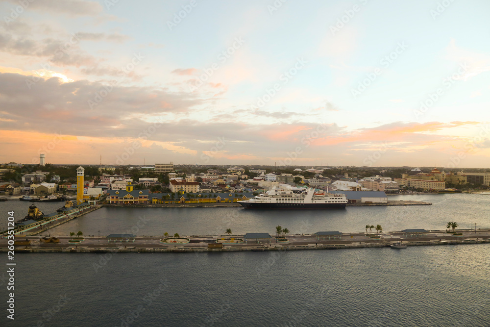 View of the port of Nassau with cruise ship docks in the forefront in the early evening sun