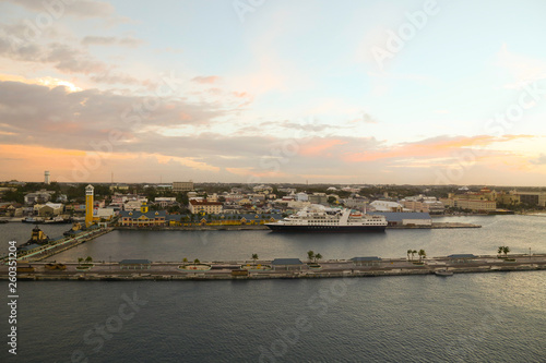 View of the port of Nassau with cruise ship docks in the forefront in the early evening sun