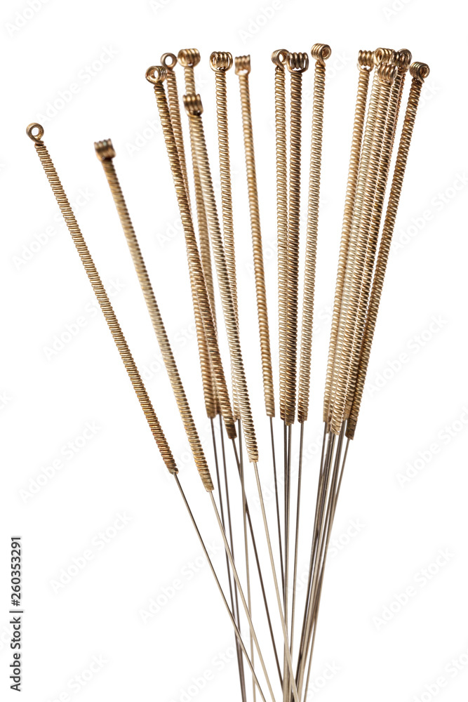 Silver needles for traditional Chinese medicine acupuncture. Close-up. Isolated on white background. Silver needles for traditional Chinese medicine acupuncture. Close-up. Isolated on white background.