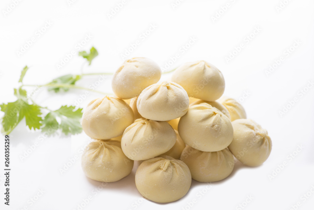 heap of frozen dumplings on a white background. Isolated Dumplings heap of frozen dumplings on a white background. Isolated Dumplings
