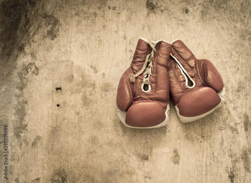 Boxing gloves on a wooden background