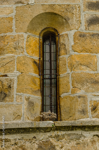 Detail of the window of the Collegiate Church of San Salvador de Cantamuda. Palencia photo