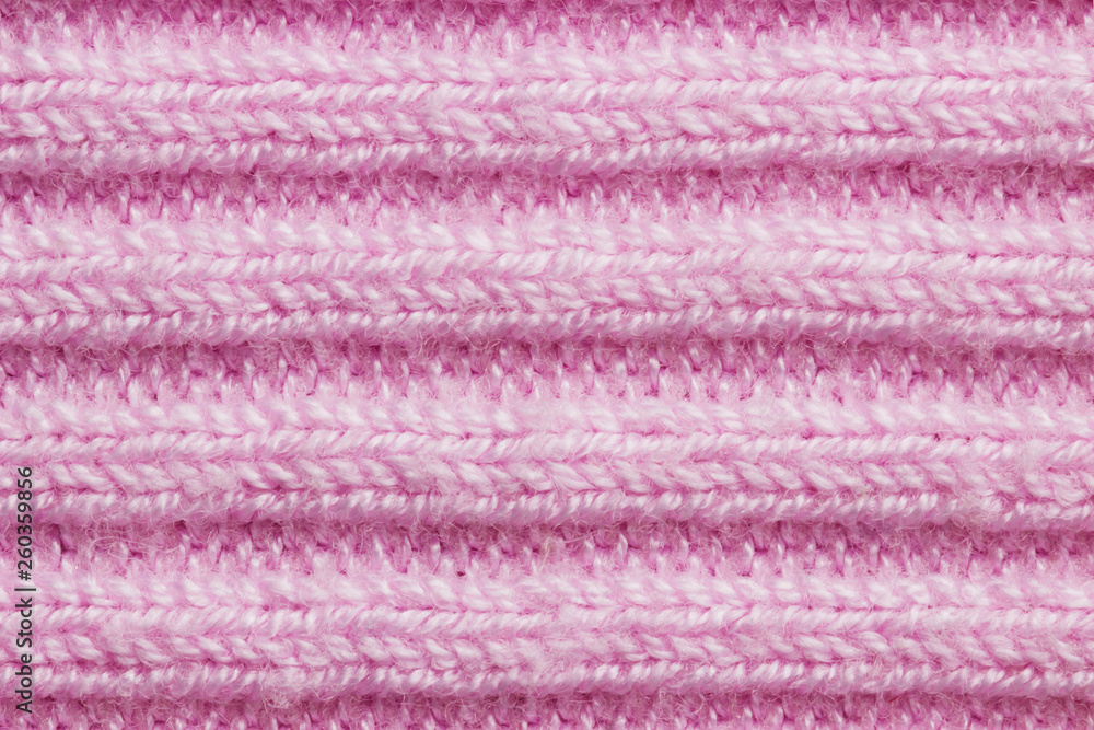 Pink knit background with patterns Pink knit background with patterns