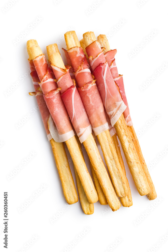 Parma ham prosciutto with grissini breadsticks. Parma ham prosciutto with grissini breadsticks.