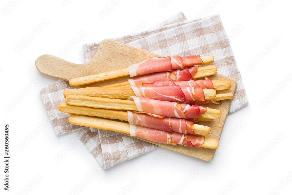 Parma ham prosciutto with grissini breadsticks.