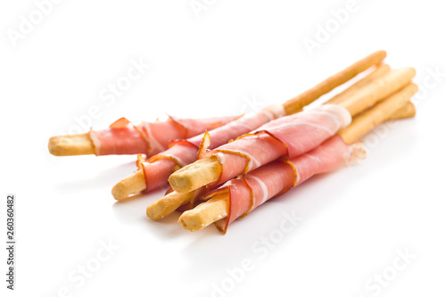 Canvastavla Parma ham prosciutto with grissini breadsticks.