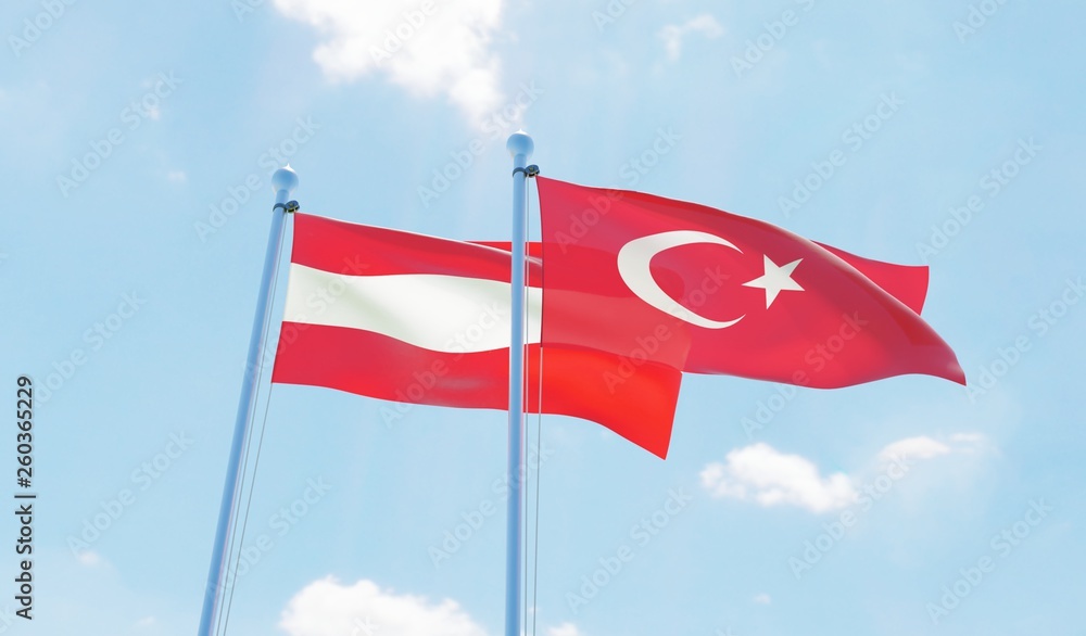 Austria and Turkey, two flags waving against blue sky. 3d image Austria and Turkey, two flags waving against blue sky. 3d image