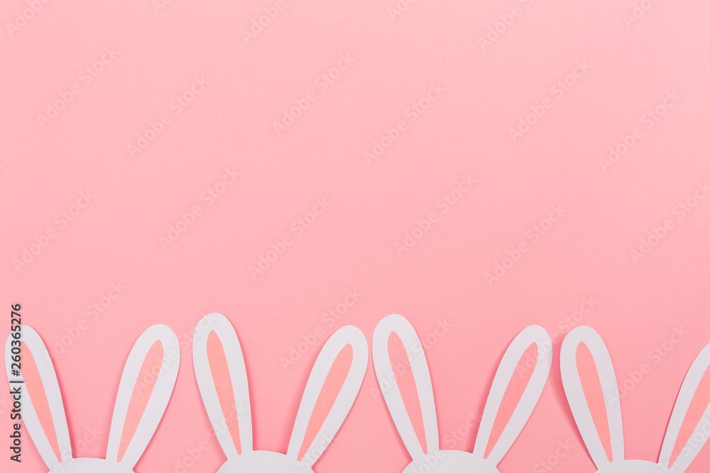 Easter bunny ears decoration holiday theme on a pink background