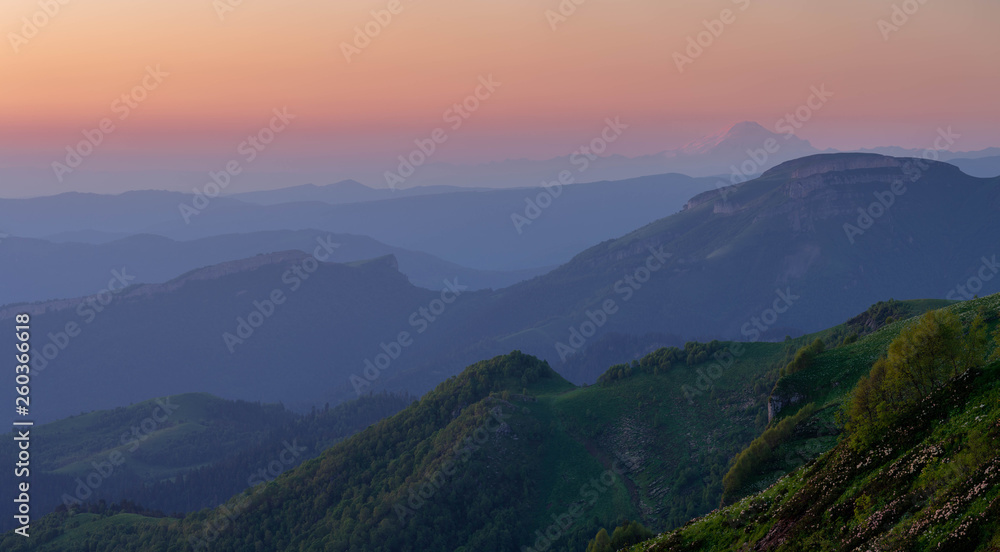 Russia. The formation and movement of clouds over the summer slopes of Adygea  the Caucasus Mountains