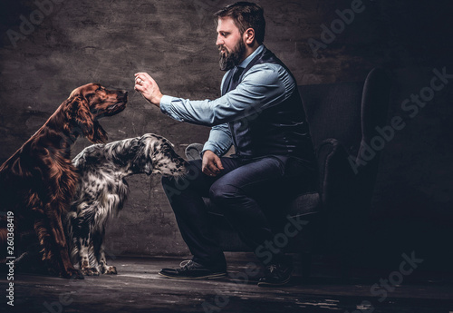 Bearded hunter wearing eleg...