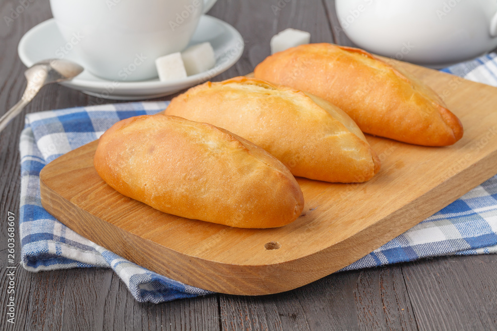 Traditional Russian baked pies (pirozhki).