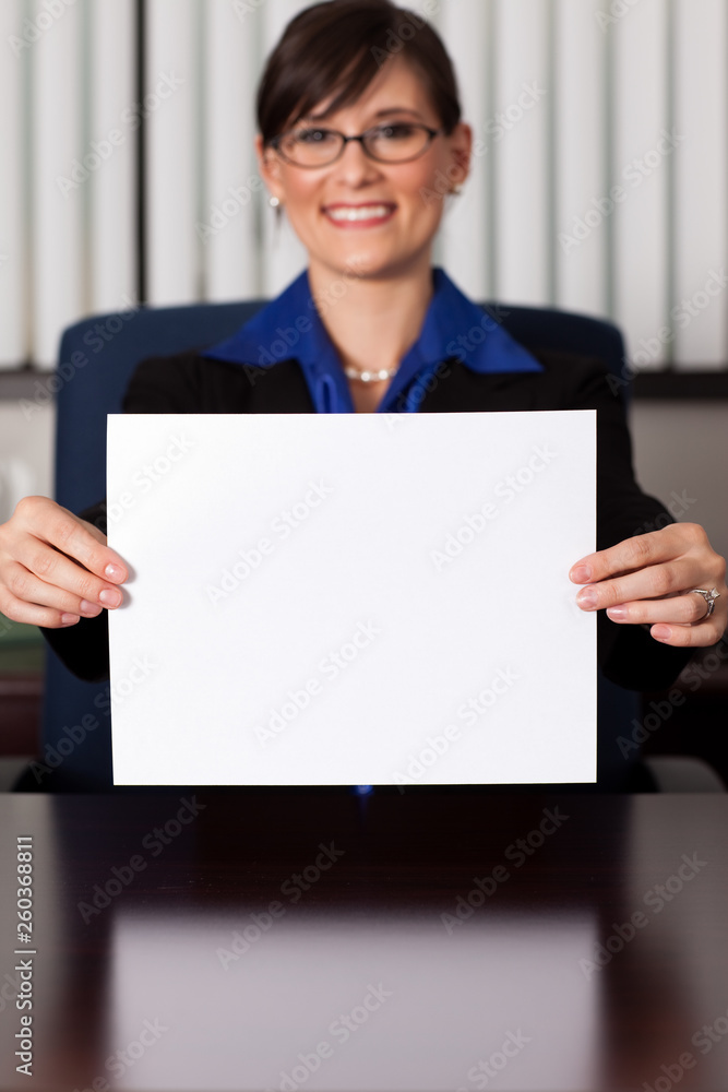 Happy Businesswoman Holding Blank Sign - Business Concept Happy Businesswoman Holding Blank Sign - Business Concept