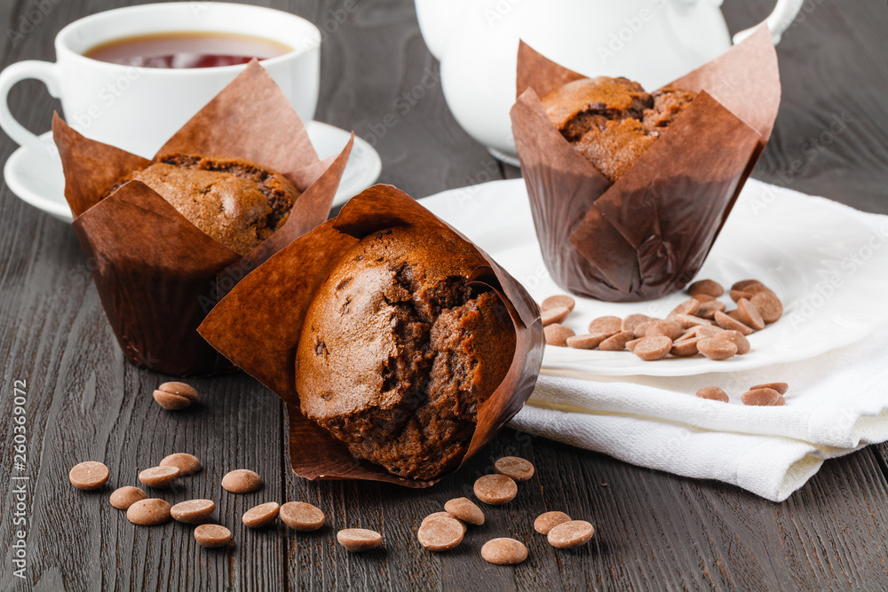 Closeup of some appetizing plain muffins for breakfast Closeup of some appetizing plain muffins for breakfast