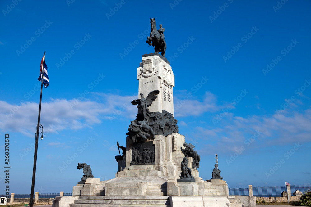 Fototapeta premium Statue of General Maximo (Maceo) Gomez with the Cuban flag in Central Havana, Cuba...