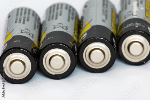 AA batteries on white background