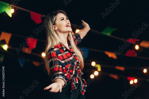 Brazilian woman wearing typical clothes for the Festa Junina - June festival