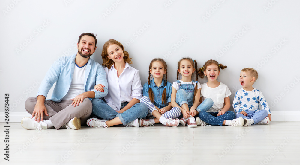 large family mother father and children sons and daughters on white background large family mother father and children sons and daughters on white background