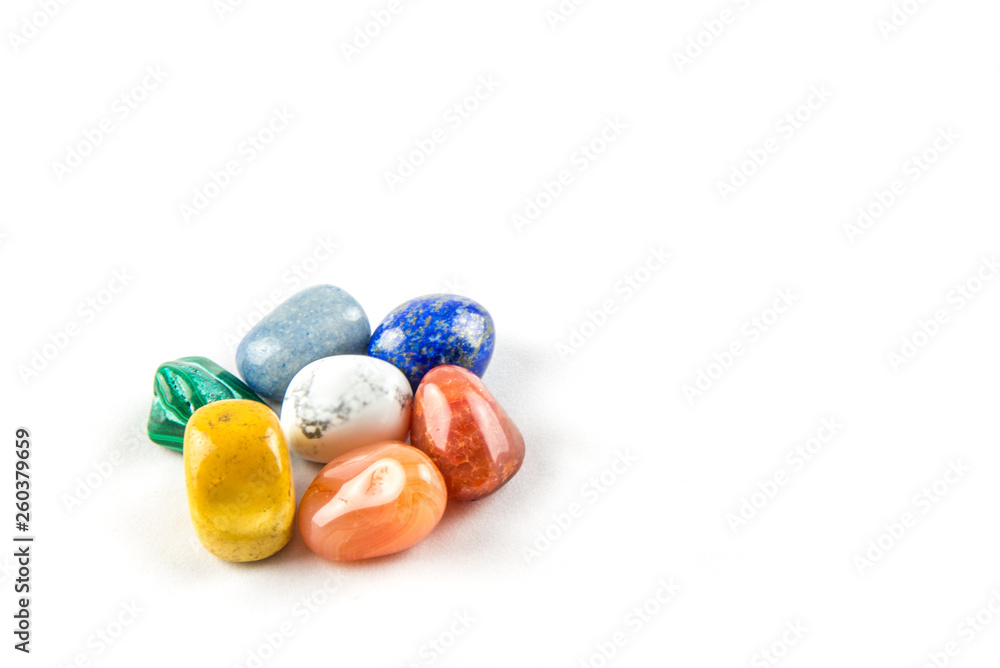 Colored chakra stones grouped in a circle Colored chakra stones grouped in a circle