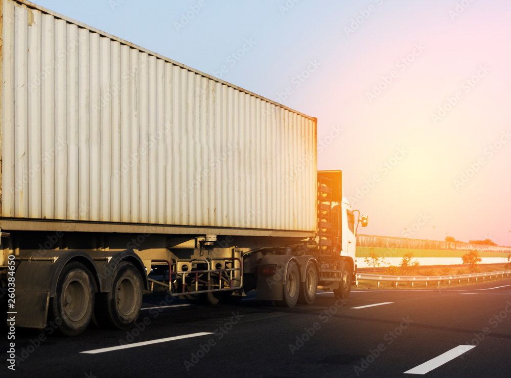 White Truck on highway road with container, transportation concept.,import,export logistic industrial Transporting Land transport on the asphalt expressway White Truck on highway road with container, transportation concept.,import,export logistic industrial Transporting Land transport on the asphalt expressway