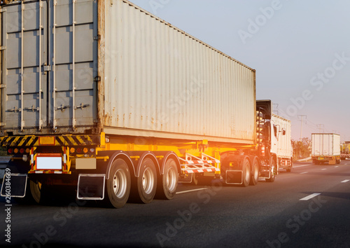 White Truck on highway road with container, transportation concept.,import,export logistic industrial Transporting Land transport on the asphalt expressway