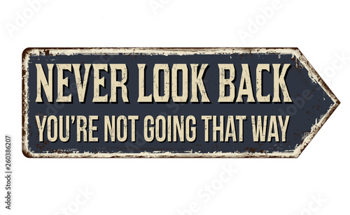 Never look back you're not going that way vintage rusty metal sign