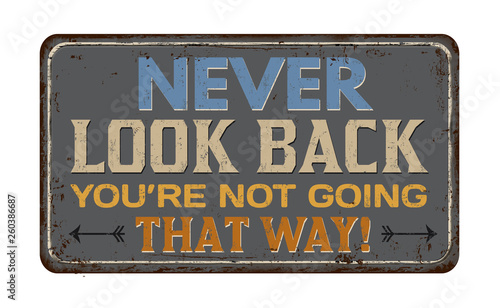 Never look back you're not going that way vintage rusty metal sign