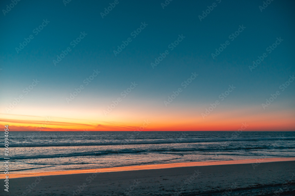 Blue sky after sunset on sea or ocean. Natural sky gradient example. Horizon line