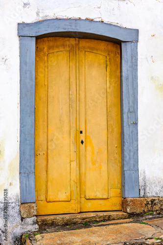 Old and aged historic church door from the Empire era in colonial wooden architecture in the city of Ouro Preto, Minas Gerais © Fred Pinheiro