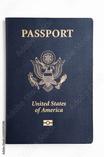 The iconic dark blue hard cover with gold stamping of an American passport set on a plain white background.