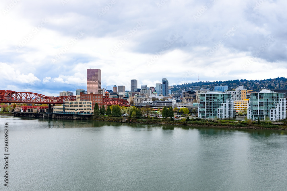 Panoramic view of Portland, Oregon downtown from river bank